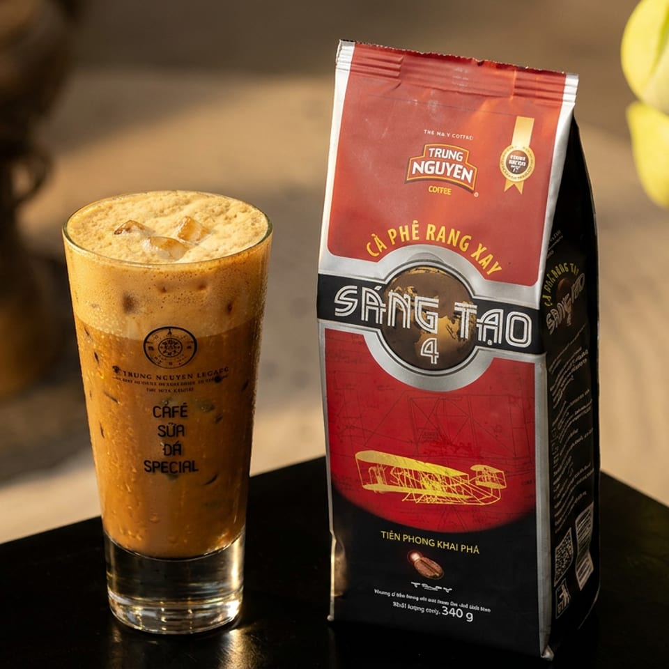 Iced Cafe Sua Da Special next to a Trung Nguyen Sang Tao 4 coffee bag.